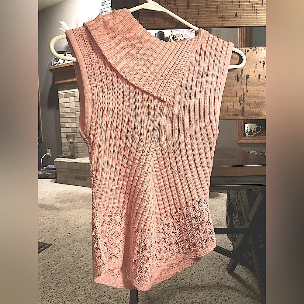 Pink sleeveless sweater. Light weight, simple & pretty! Fits like a size small